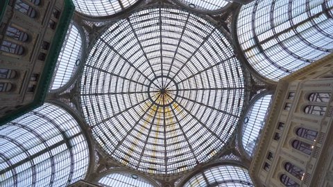 NAPLES, ITALY - 05 NOVEMBER, 2018 - Cupola of Galleria Umberto I, a public shopping gallery in Napoli and its interiors in 4k
