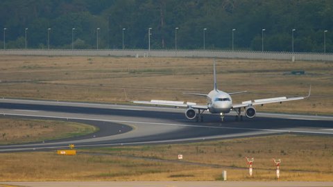 FRANKFURT AM MAIN, GERMANY - JULY 19, 2017: Lufthansa Airbus 320 taxiing after landing at 07L. Fraport, Frankfurt, Germany
