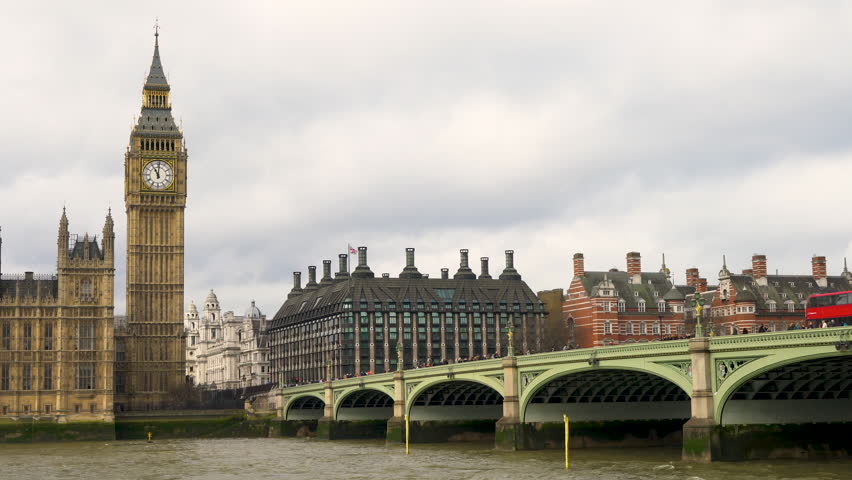 4K video of red bus, traffic and people on Westminster Bridge over the River Thames next to Big Ben and The Houses of Parliament, London, England Royalty-Free Stock Footage #1026508937