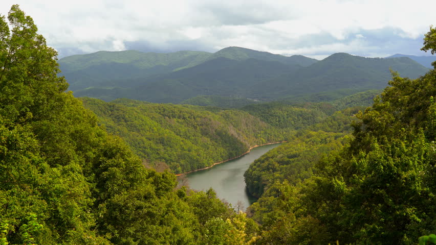 The little Tennesse river, in a deep river gorge, is surrounded by the mountains in the Great Smoky Mountains National Park, in the Nantahala National Forest.