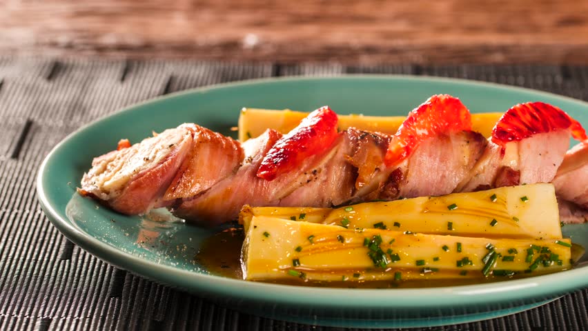 Slide shot Delicious chicken with bacon and palmito grilled pupunha