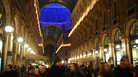 MILAN, ITALY - DECEMBER 27, 2011 Time Lapse of Milan Buyers People Walk on Shopping Mall Gallery Fashion Market