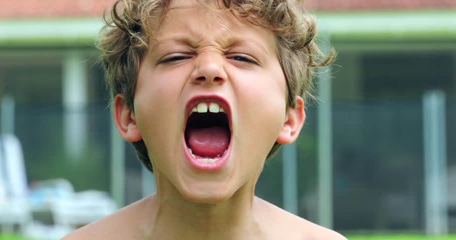 Child face screaming from top of his lung in slow-motion | Shutterstock HD Video #1026521129