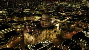Aerial drone night video of iconic Saint Paul landmark Cathedral in the heart of City financial district of London, United Kingdom