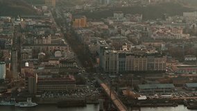 Drone shot over megapolis at sunset. Big city on a river aerial view.
Shot in 6K RAW downscaled to 4K 
