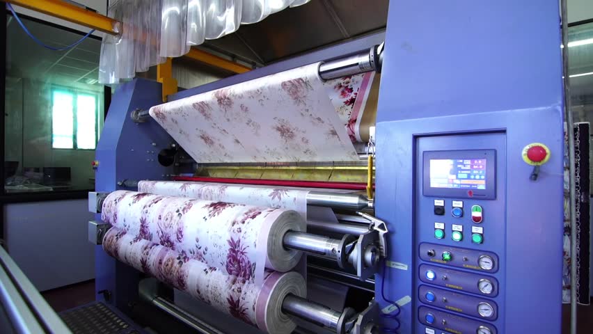 Industrial sublimation printer for digital printing on fabrics. Modern textile industry. Textile printing is the process of applying colour to fabric in definite patterns or designs. handmade in italy Royalty-Free Stock Footage #1026526865