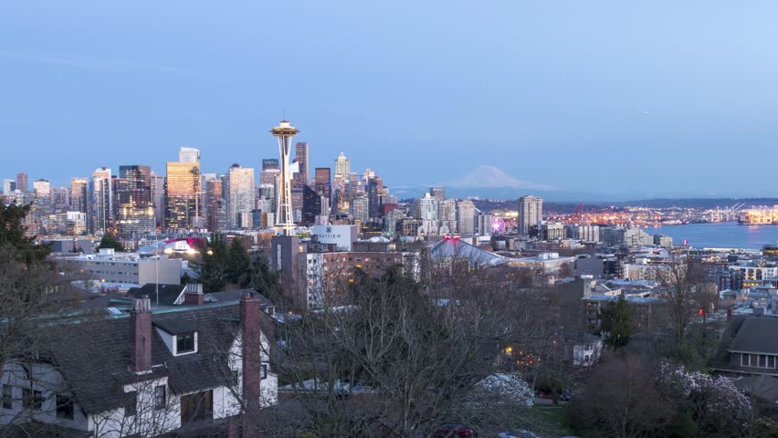 Seattle, WA USA Day to Night Time Lapse  with Mt. Rainier in the distance 4K.