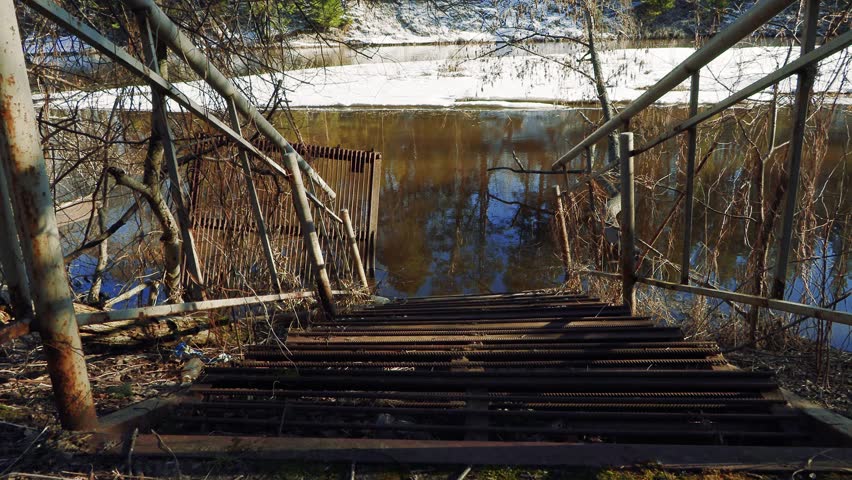 old rusty jetty by the river