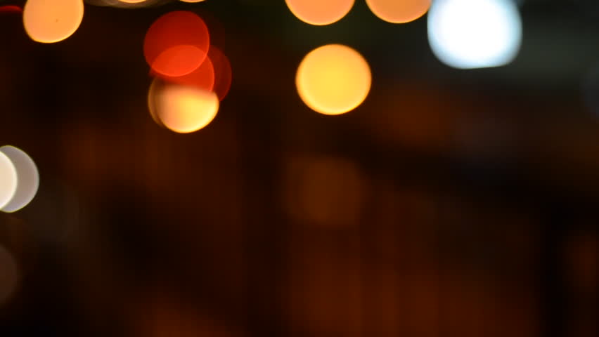 defocused street lights and car headlights at night creating bokeh