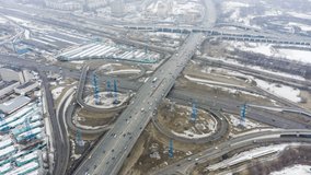 timelapse video of the multi-level road junction in Moscow from above, car traffic and concept of transportation. road junction at the intersection of the Ryazanskiy Avenue and the Moscow ring road.