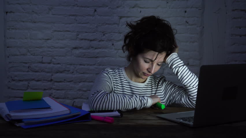 4k wide slider video of Overworked and tired female student falling asleep on the desk while working late at night on her computer laptop. In studying for final exams and overworked concept. | Shutterstock HD Video #1026578939