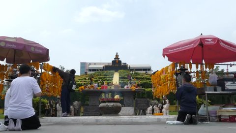 Bangkok, Thailand - March 29 2019: Students worship at The Statue of King Ramkhamhaeng The Great, situated in Ramkhamhaeng university. He is credited for the creation of the Thai alphabet.