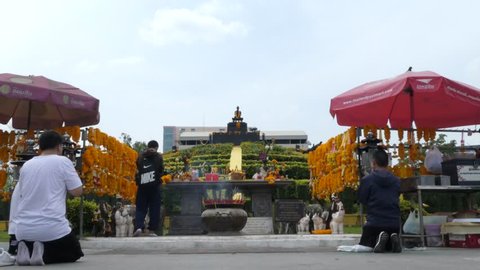 Bangkok, Thailand - March 29 2019: Students worship at The Statue of King Ramkhamhaeng The Great, situated in Ramkhamhaeng university. He is credited for the creation of the Thai alphabet.