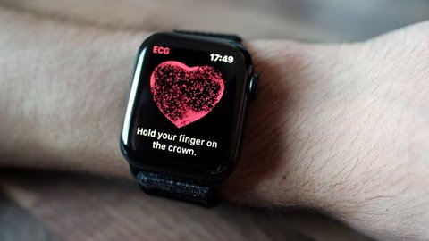 Zurich, Switzerland - March 30, 2019: Apple Watch Series 4 ECG on man's arm, Electrocardiogram / Electrocardiograph demonstration