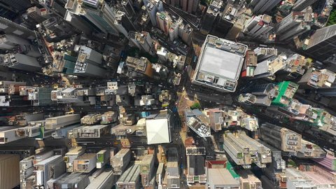HONG KONG - OCTOBER 15 2018: sunny hong kong city downtown district traffic streets high aerial topdown panorama 4k circa october 15 2018 hong kong.
