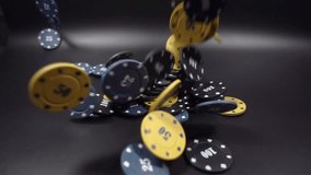 Poker Chips Falling in Slow Motion on black background - Powered by Shutterstock - Get 15% off with code: PIKWIZARD15