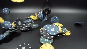Poker Chips Falling in Slow Motion on black background - Powered by Shutterstock - Get 15% off with code: PIKWIZARD15