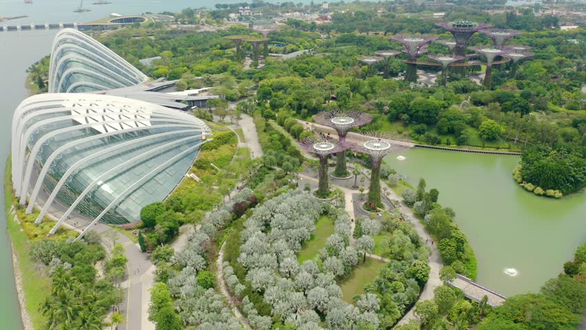 Drone Aerial view 4k Footage Of Gardens By The Bay, Flying Towards Skyline Singapore. Marina Bay In Singapore. Royalty-Free Stock Footage #1026628553