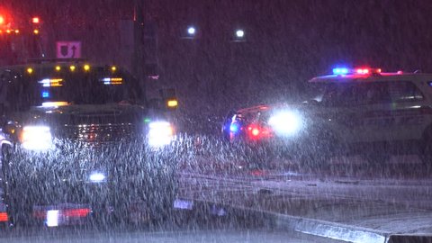 March, Ontario, Canada March 2019 Car accident in city intersection at night in snow storm and blizzard conditions