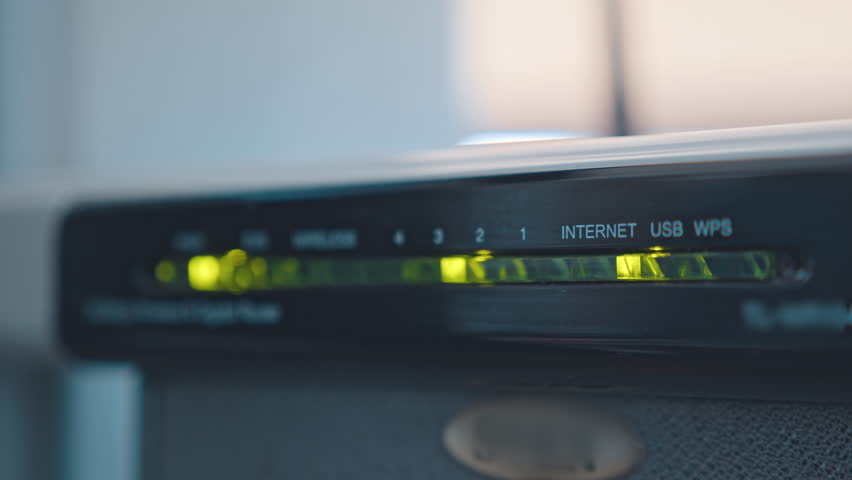 Working router with powering lights and internet connection status. Wireless device with antenna Wi-Fi wireless, broadband Royalty-Free Stock Footage #1026651107