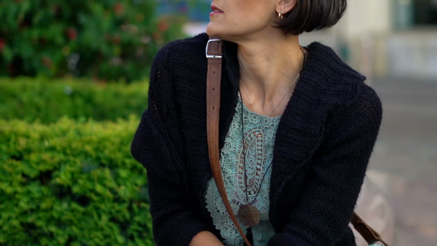 Portrait of happy, young woman in the city