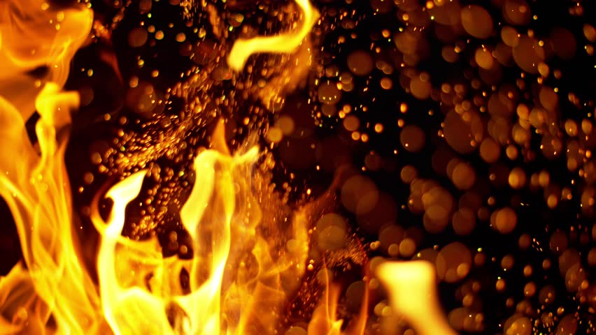 Fire flames and sparks in super slow motion isolated on black, shooting with high speed cinema camera at 4K