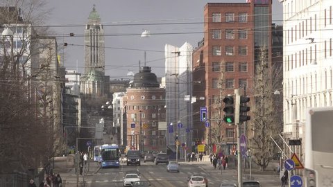 Traffic in the centre of Helsinki and with Kallio Church in the background