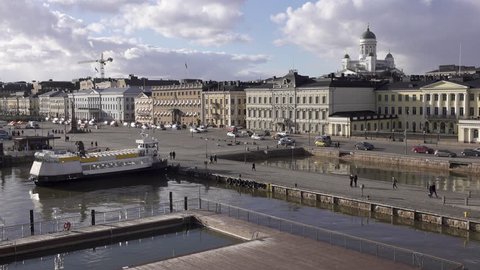 High view of Market Square in Helsinki with Presidential Palace on the right and Helsinki Cathedral in the background