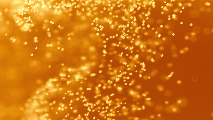 Macro Shot Of Fine Bubbles Rising In A Glass With Orange Liquid Royalty-Free Stock Footage #1026670169