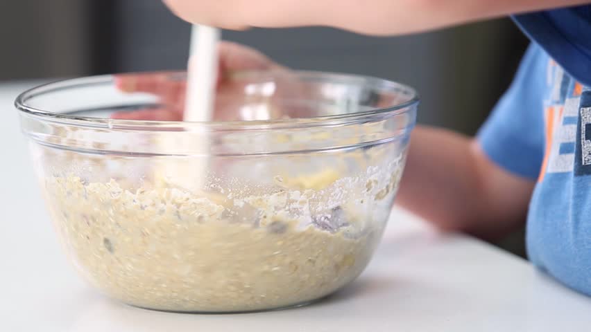 Kids hands mixing ingredients in glass bowl | Shutterstock HD Video #1026675281