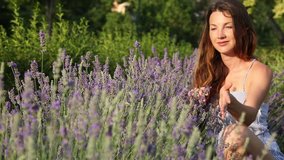 Young woman is enjoying a lavender
