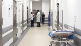 Time lapse video of busy doctors on the corridor