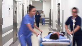 Time lapse video of busy doctors on the corridor