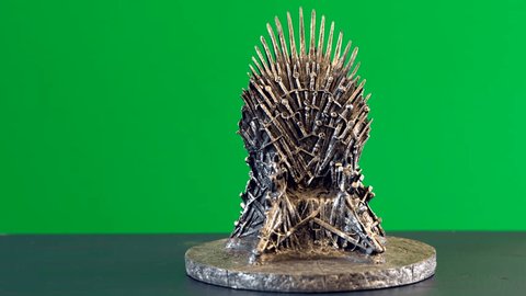 Games of Thrones HBO authorized replica of the Iron Throne, dolly shot against green screen. Adelaide, South Australia - February 6, 2019.