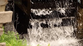Watermill in the countryside, close-up and slow-motion footage