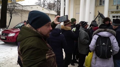 Moscow / Russia - February 22 2018: Outraged crowd of people on the street with protest. Goverment don't meet their requirements. Guy recording all on the phone camera.