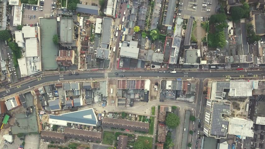 London Aerial Residential Birds Eye View High Street Top Down Push Up Reveal Drone London Red Bus