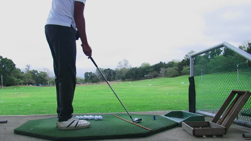 Video Stok young man practicing iron on golf (100% Tanpa Royalti) 102670050...