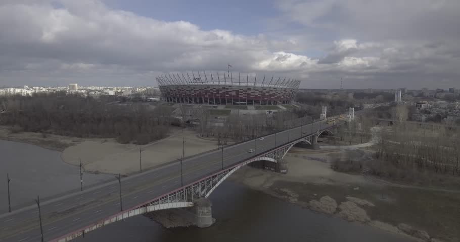 Aerial view of the Vistula river and the bridges and stadium, skyline Warsaw City. Span over the old bridge in Warsaw Poniatowski Bridge.