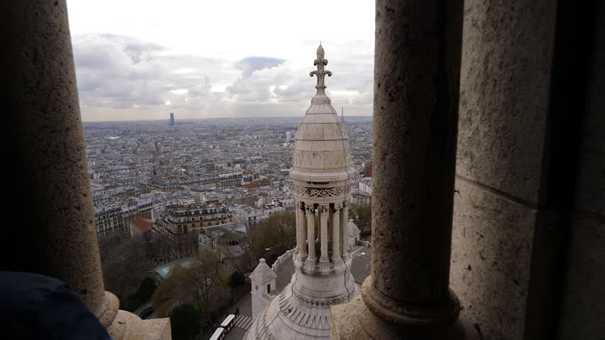 Moving shot of tourists overlooking Paris 