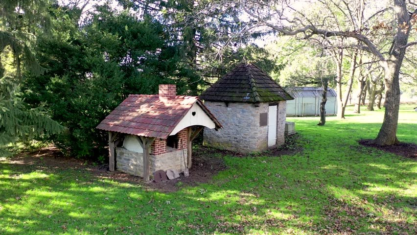 Aerial pan of outbuilding including a brick baking over on the property of Herr House Lancaster County PA. Concept: National Park Service, Historic Places, Mennonite, colonial America, Amish, landmark