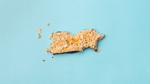 4K Stop Motion Animation Eating Protein Granola Bar. Top View