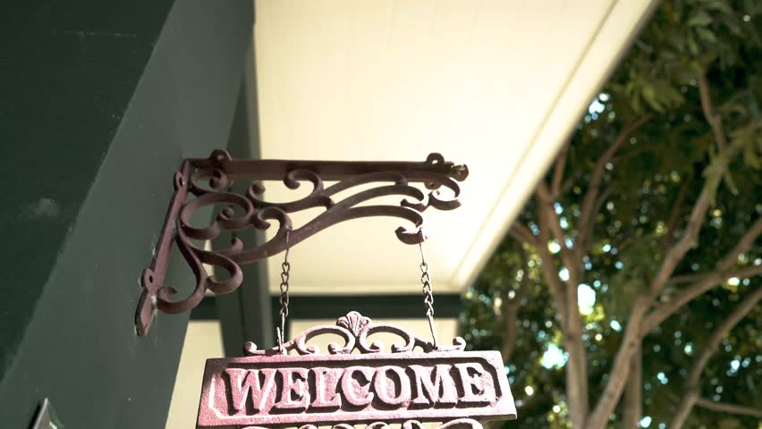 Vintage welcome sign in summer looking environment