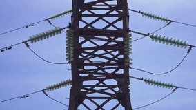 High-voltage electrical pylons against a blue sky - Powered by Shutterstock - Get 15% off with code: PIKWIZARD15