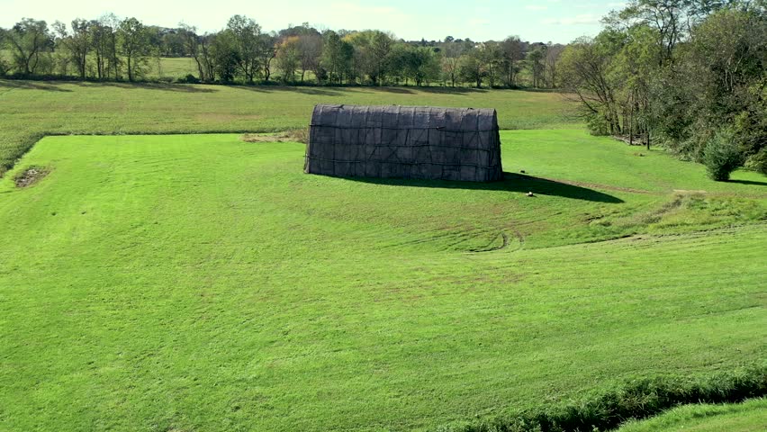 Aerial slow approach to Native American Longhouse on the Herr House property, Lancaster County PA.Concept: educational, replica, Native American culture, interactive exhibit