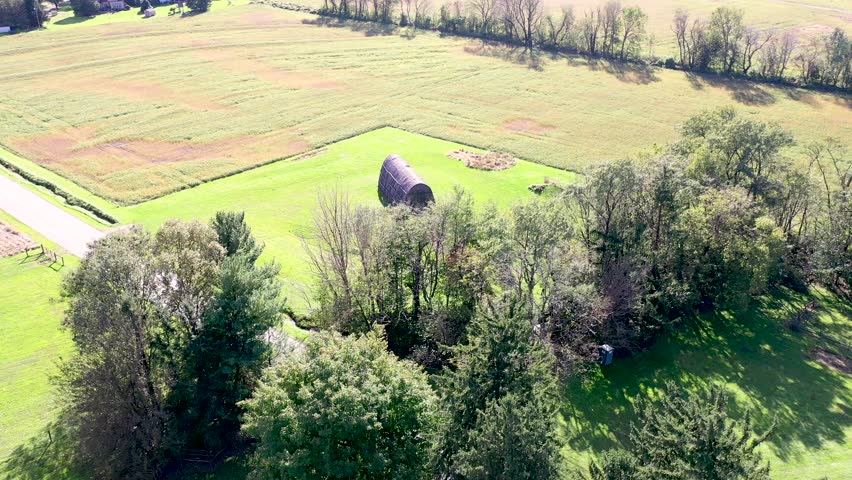 ?Aerial high fast approach to Native American replica Longhouse, Herr House property Lancaster County PA Concept: educational, replica, Native American culture, interactive exhibit