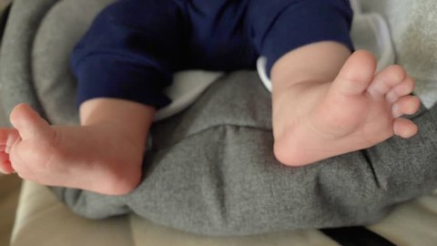 Feet of newborn baby closeup