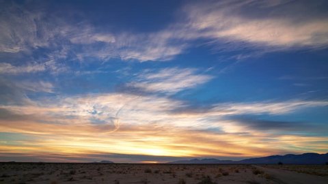 Golden Fire Sunset Time Lapse in Mojave Desert with blue, red, and purple light