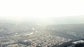 Beautiful Tbilisi on a cloudy day, aerial footage from behind the TV tower, 4k, Go Everywhere