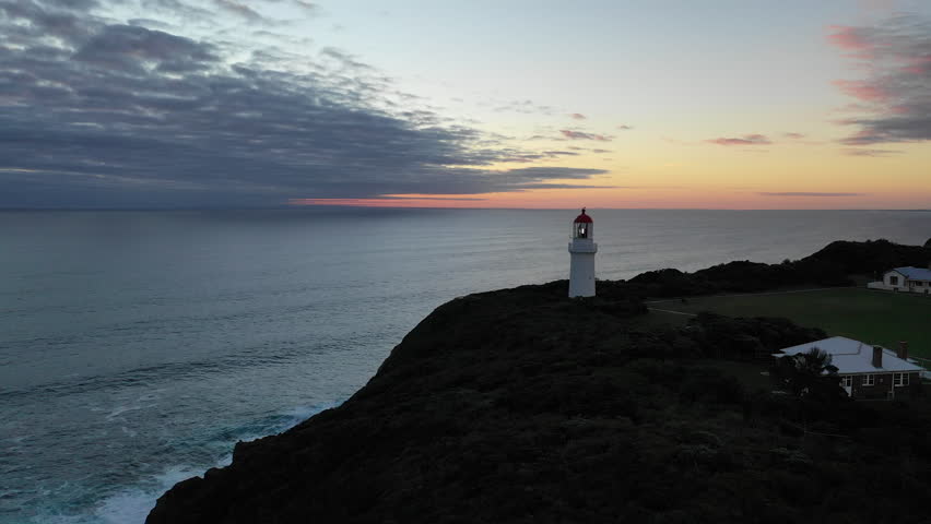 Elevated aerial view over the Cape Schank lighthouse at dusk on the Mornington Peninsula, Melbourne, Australia